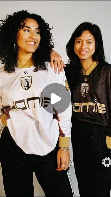 Two models wearing the MUMA FC kit