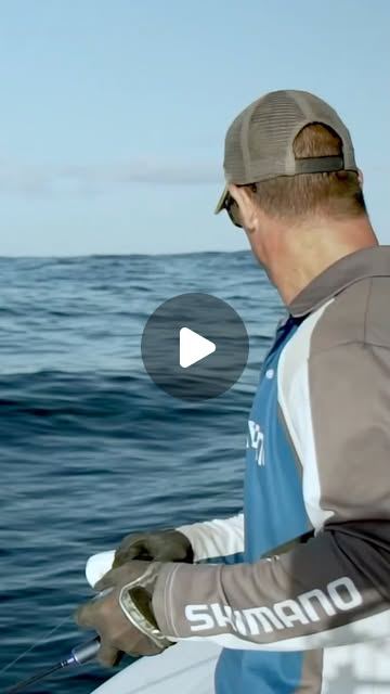 Angler casting from a Shimano boat